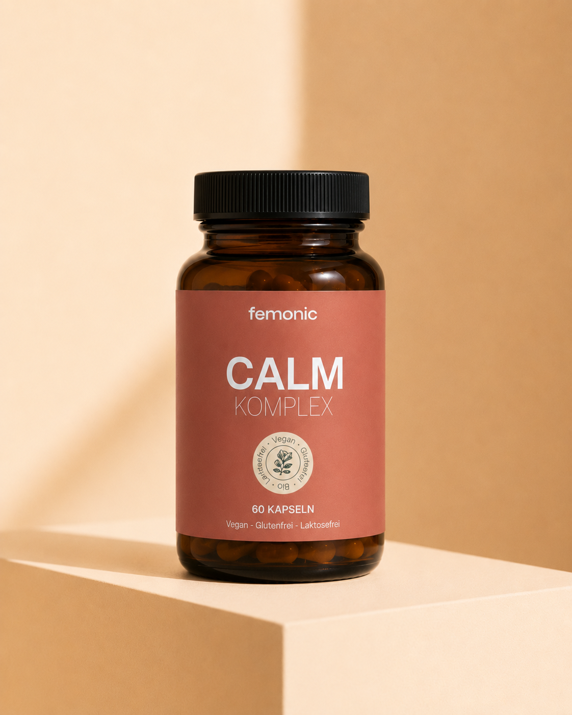 femonic Produktdose, minimalistisch, Creme-Hintergrund.